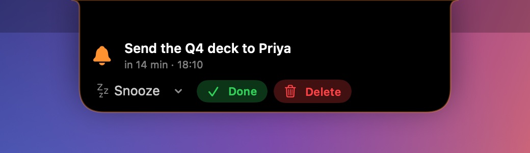 A reminder alert dropping down from the notch with Snooze, Done and Delete